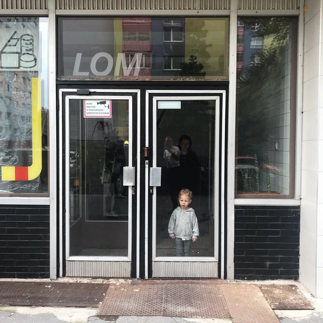 Glass entrance of LOM space in Bratislava